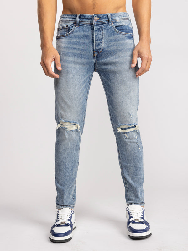 מכנסי ג''ינס לגבר בגזרת SUPER SKINNY