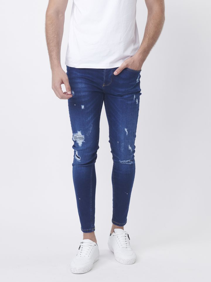 ג’ינס סקיני עם קרעים