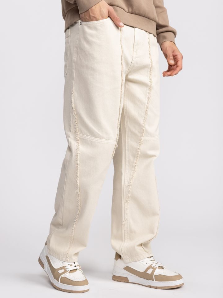 מכנסי ג’’ינס עם תפרים פרומים לגבר