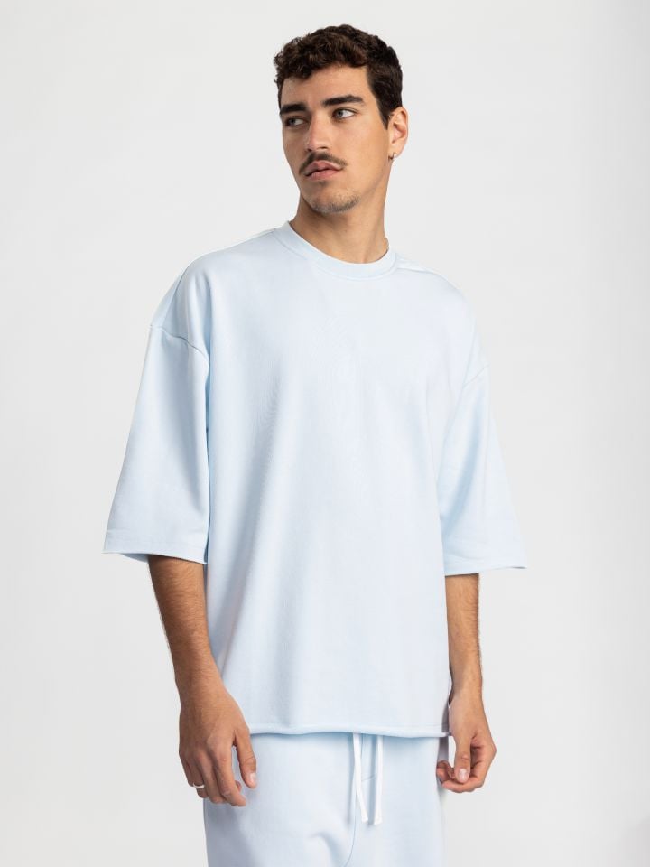 חולצה קצרה עם סיומת פרומה