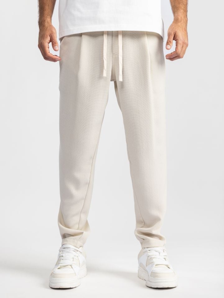 מכנסי בד טקסטורליים עם גומי ושרוך לגבר