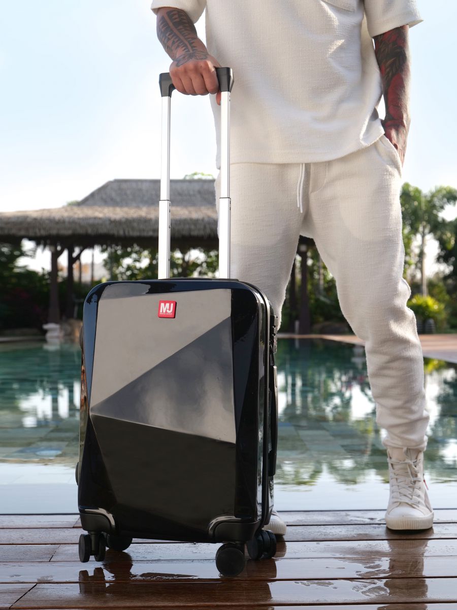 מזוודה ממותגת MANIA קשיחה