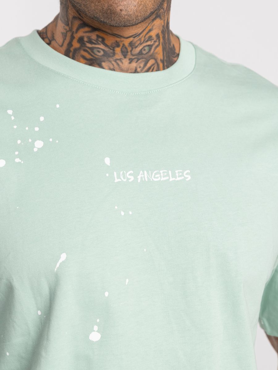 חולצת טי שירט אוברסייז עם הדפס טיפות דיו