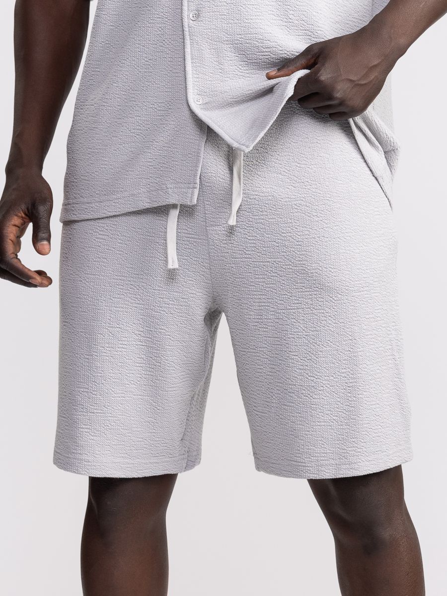 מכנסי ברמודה עם טקסטורה וכיס אחורי