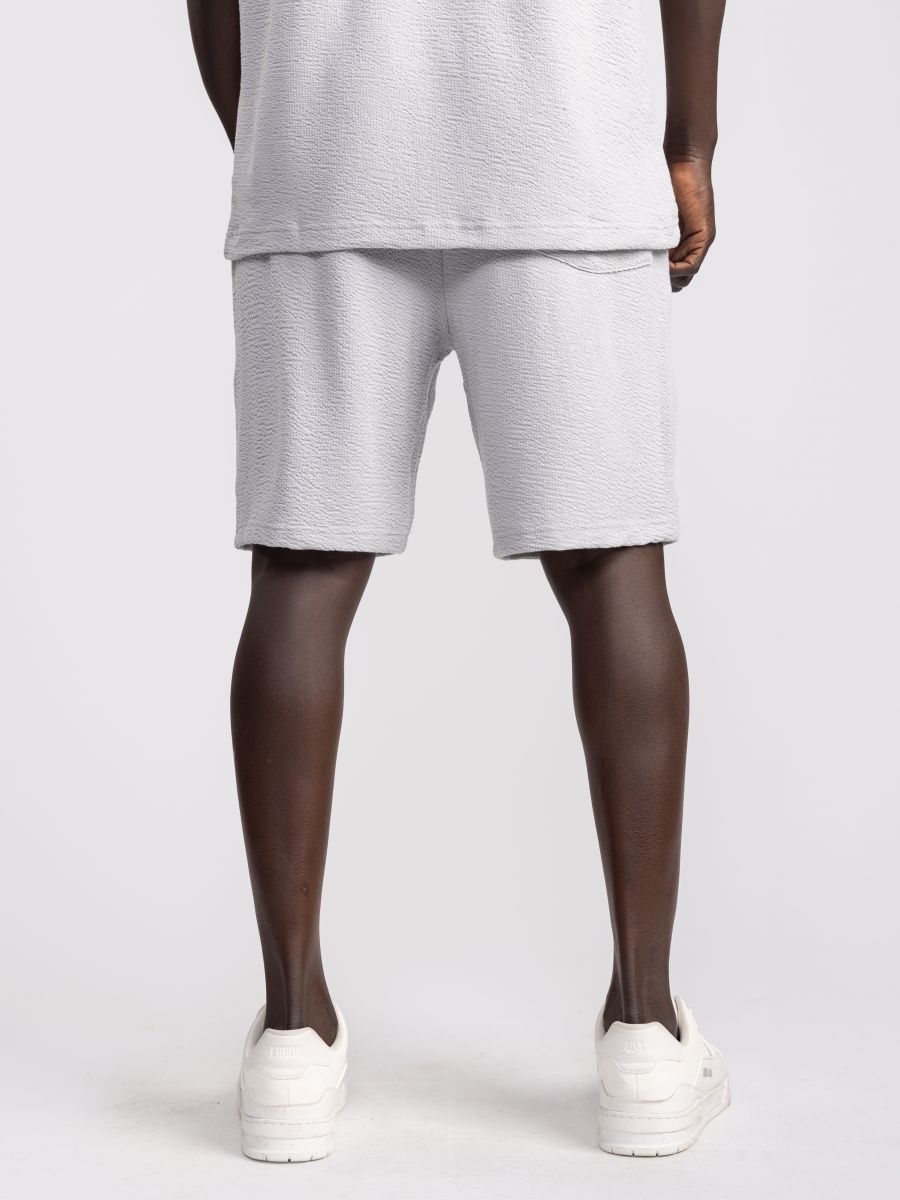 מכנסי ברמודה עם טקסטורה וכיס אחורי