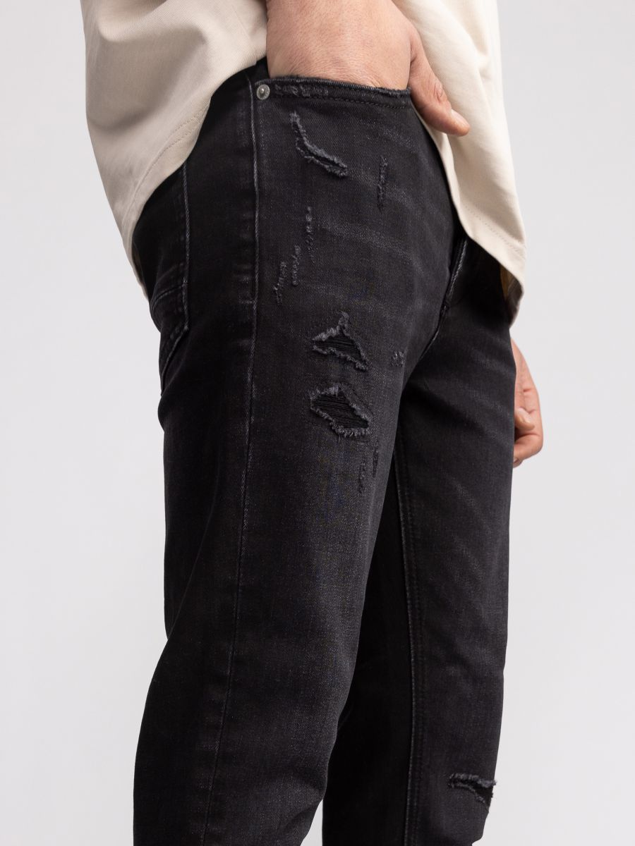 ג’’ינס סקיני לגבר עם קרעים אטומים