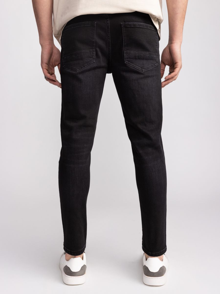 ג’’ינס סקיני לגבר עם קרעים אטומים