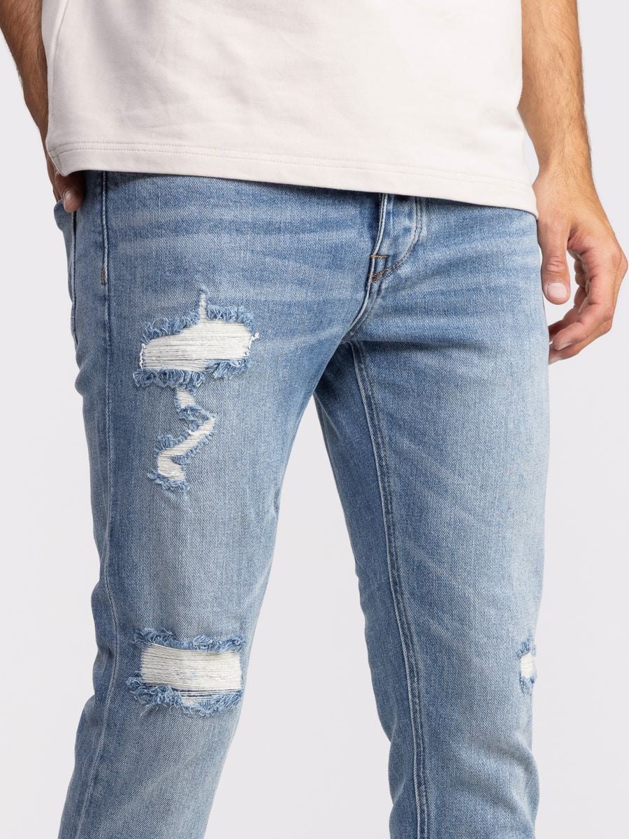 גינס סופר סקיני  עם קרעים ושפשופים