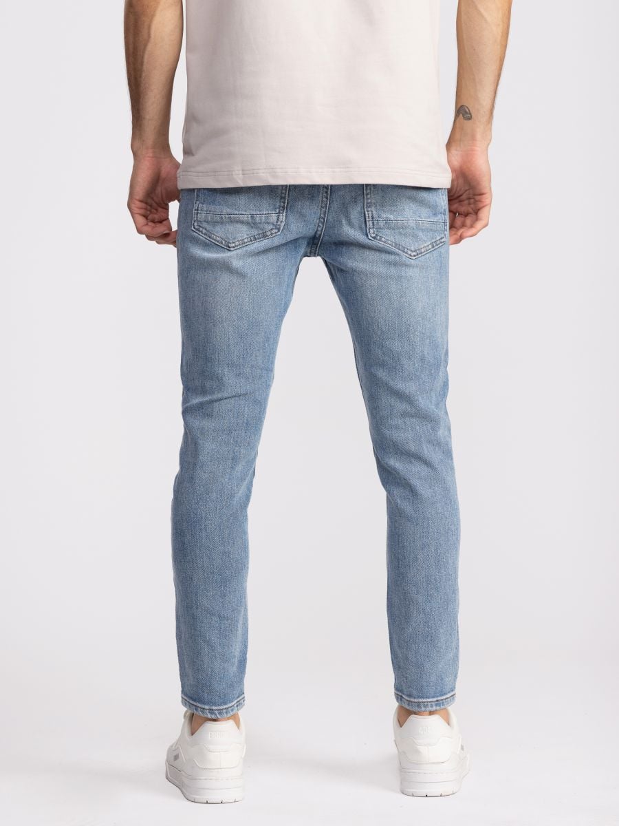 גינס סופר סקיני  עם קרעים ושפשופים