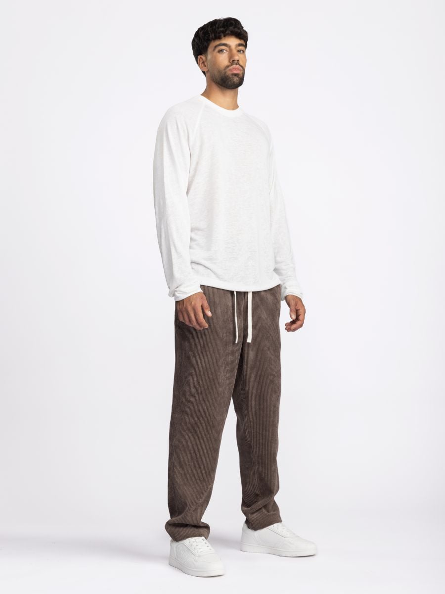 חולצת לונג סלאב מבד טקסטורלי בגזרת רגלן