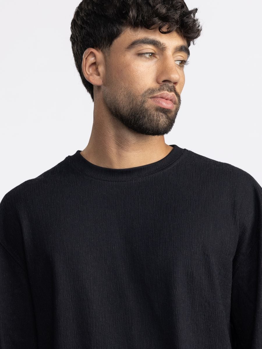 חולצת טי שירט לונג סלאב טקסטורלית