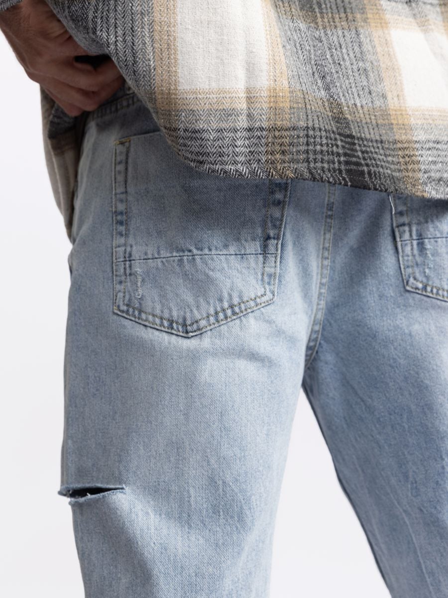 ג’’ינס קרעים משופשף לגבר