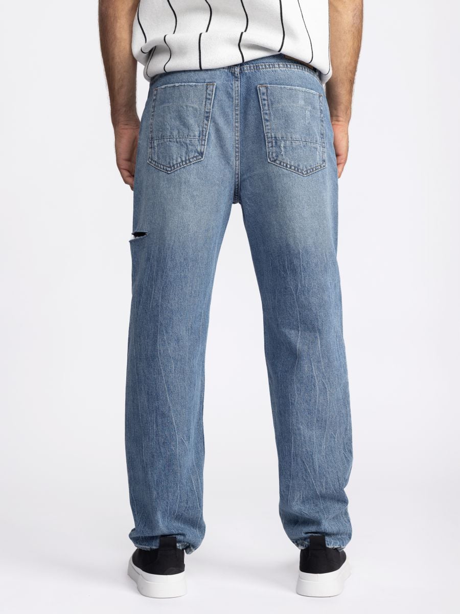 ג’’ינס קרעים משופשף לגבר