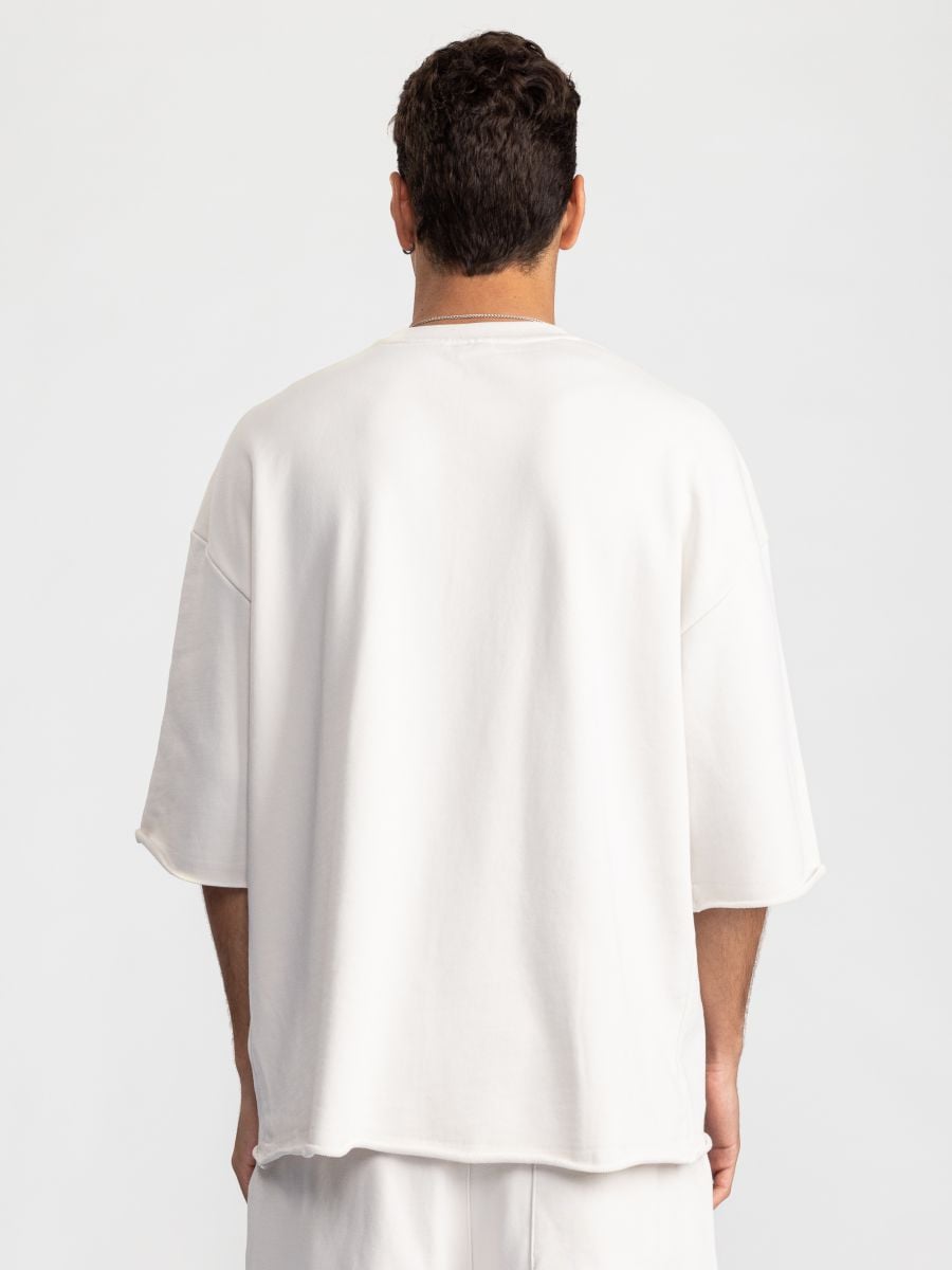 חולצה קצרה עם סיומת פרומה