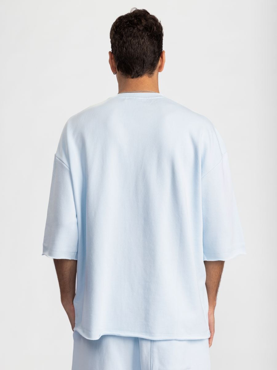 חולצה קצרה עם סיומת פרומה