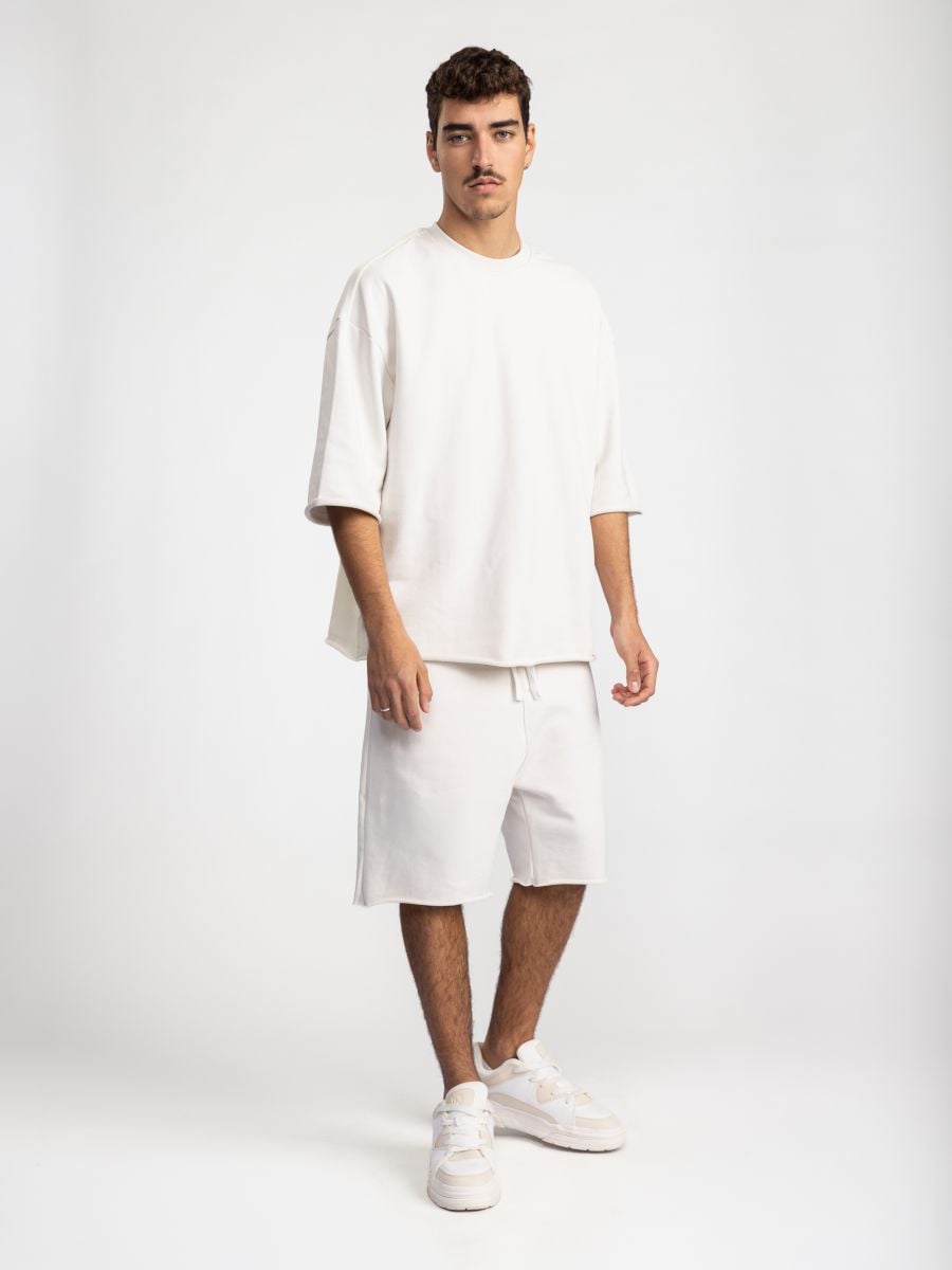 מכנסיים קצרים עם סיומת פרומה