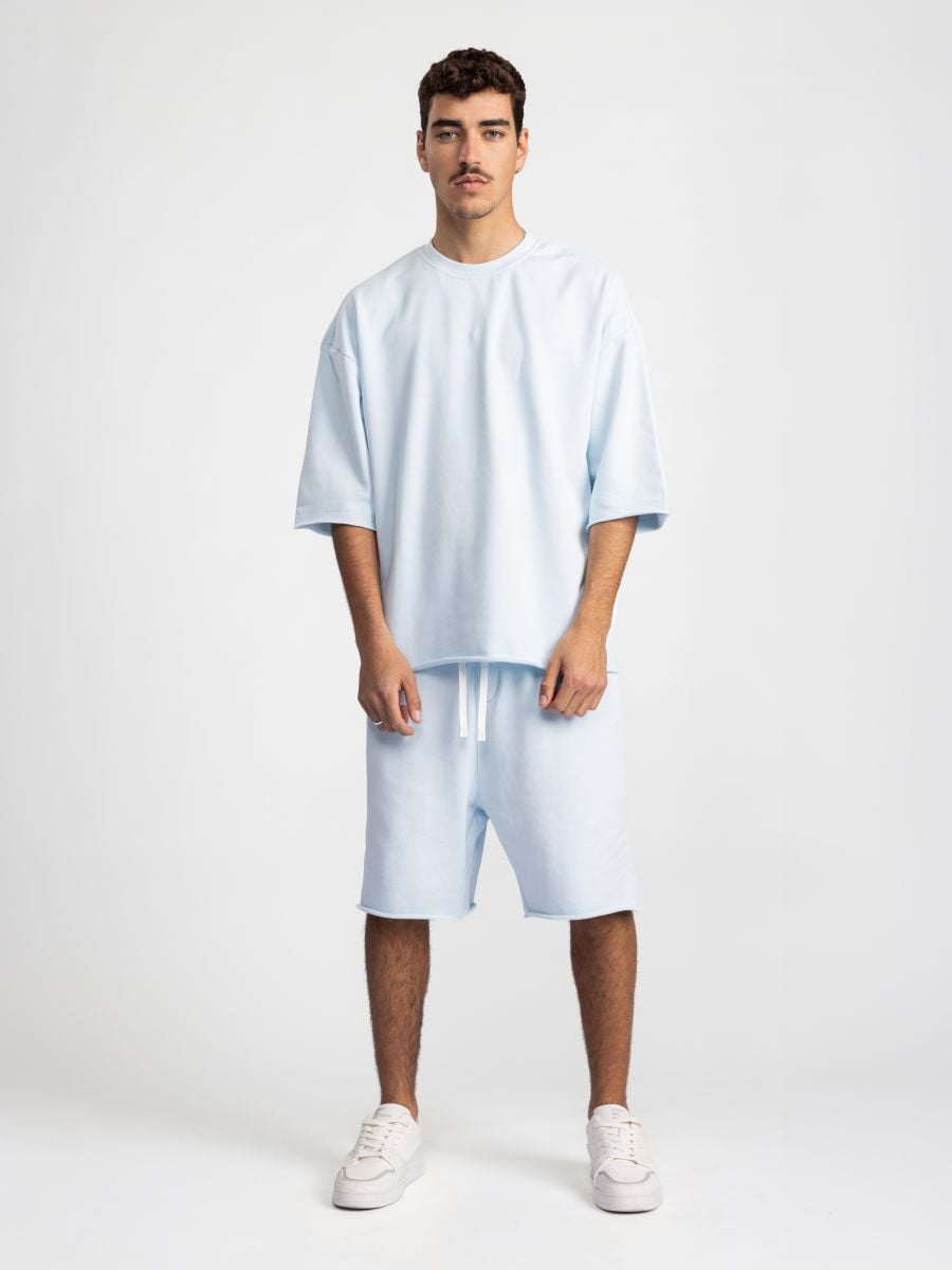 מכנסיים קצרים עם סיומת פרומה