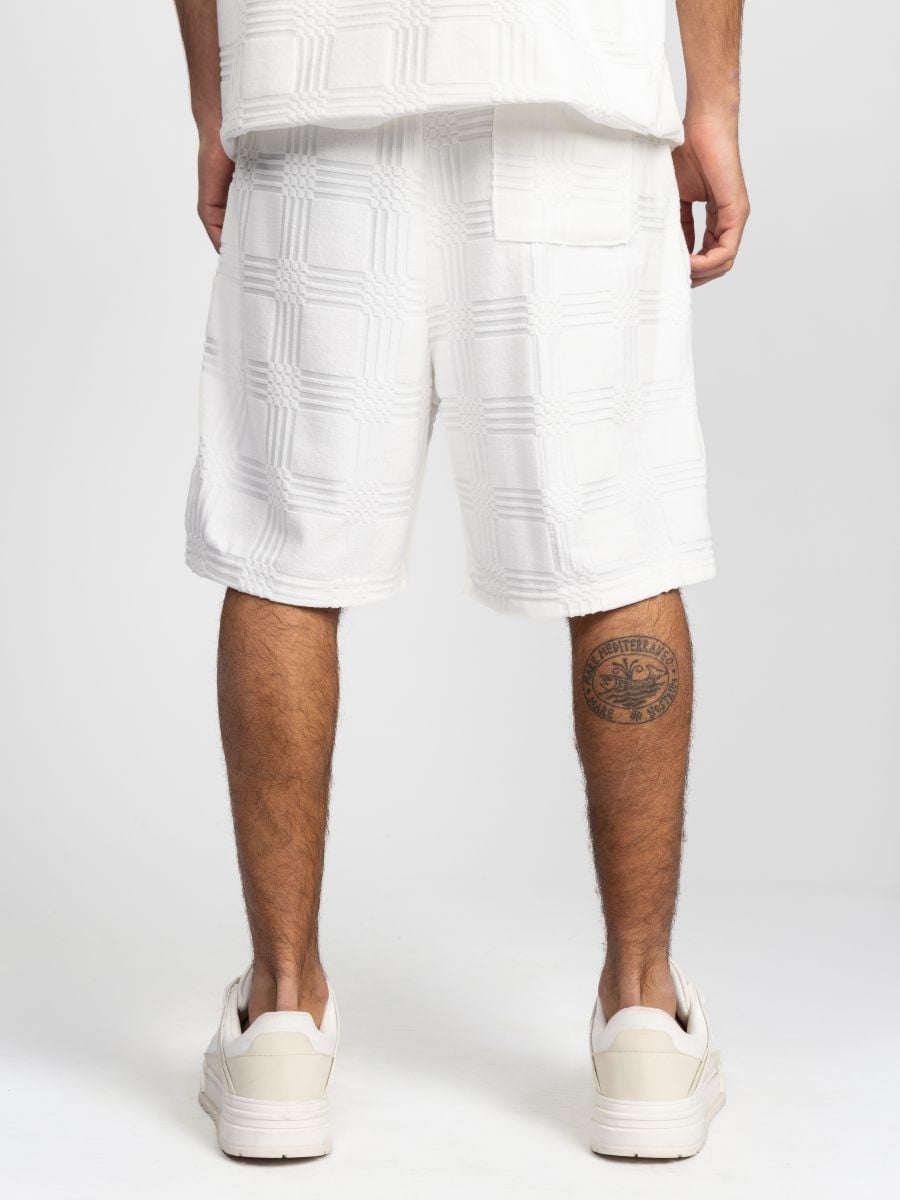 מכנסיים קצרים עם טקסטורה בדוגמת משבצות