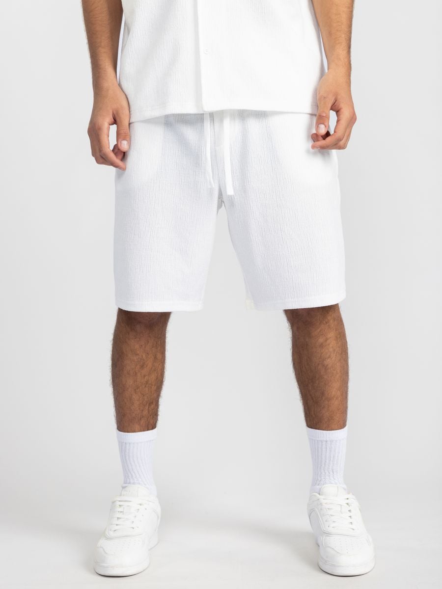 מכנסי ריזורט מבד טקסטורלי