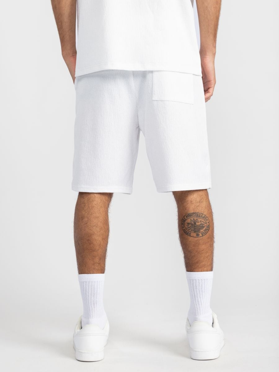 מכנסי ריזורט מבד טקסטורלי