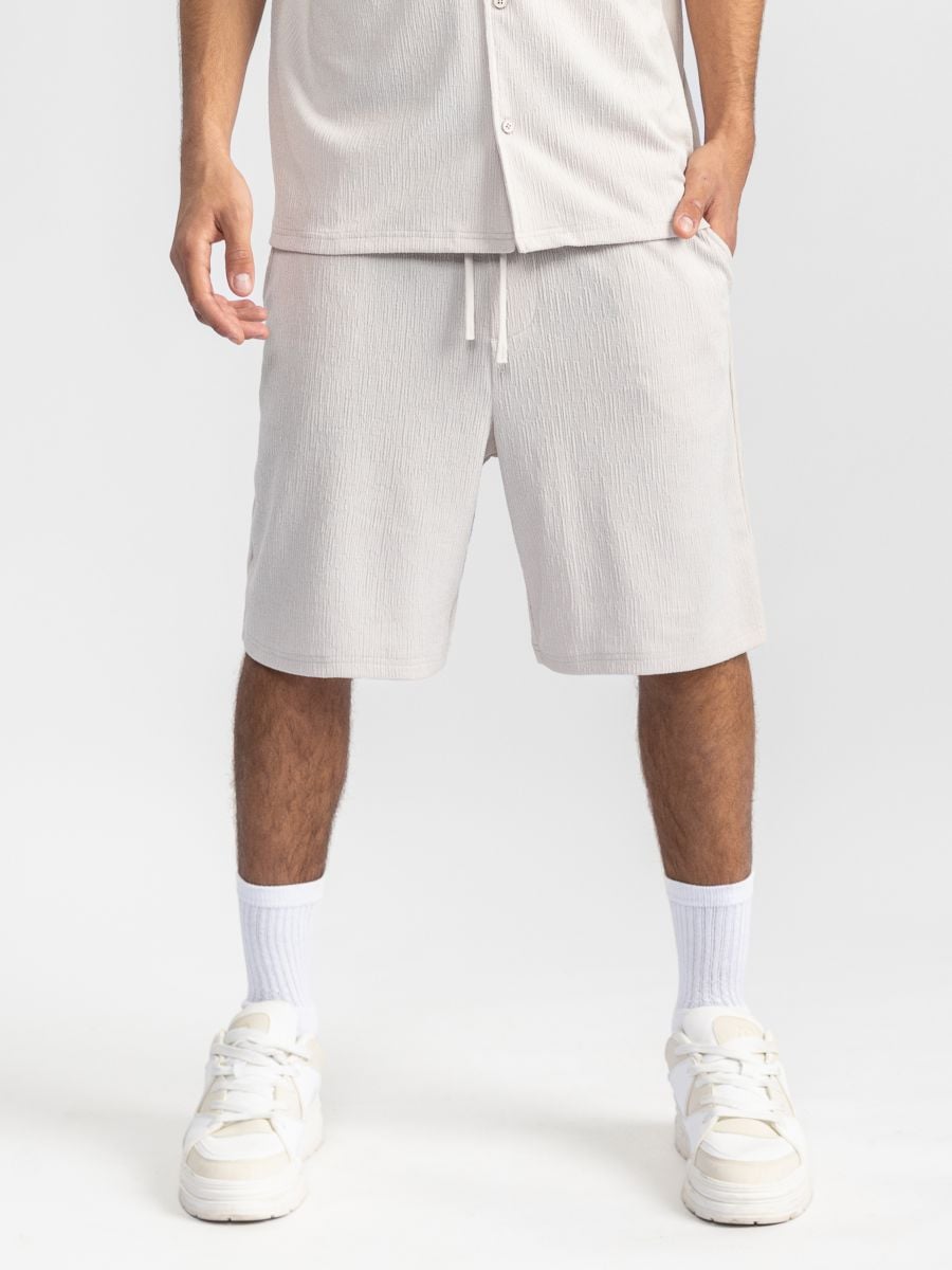 מכנסי ריזורט מבד טקסטורלי