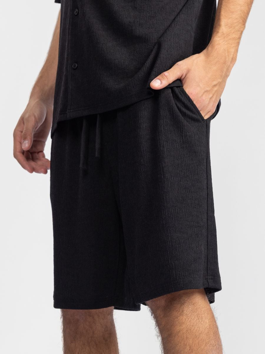 מכנסי ריזורט מבד טקסטורלי