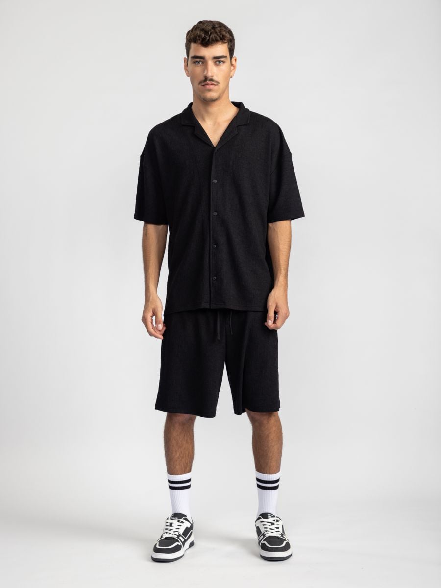 חולצת ריזורט מכופתרת לגבר מבד טקסטורלי