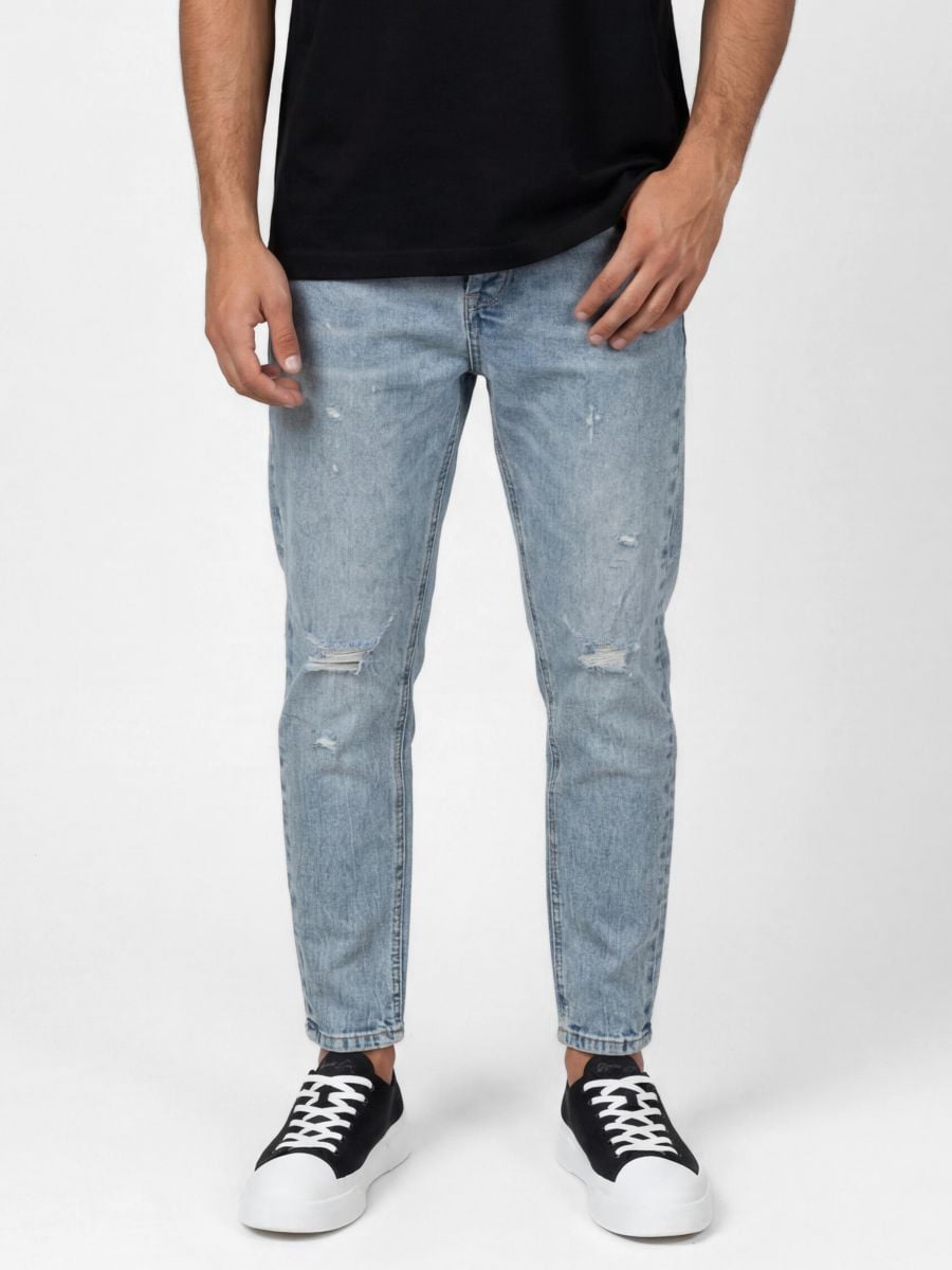 גינס לגבר עם קרעים ושפשופים