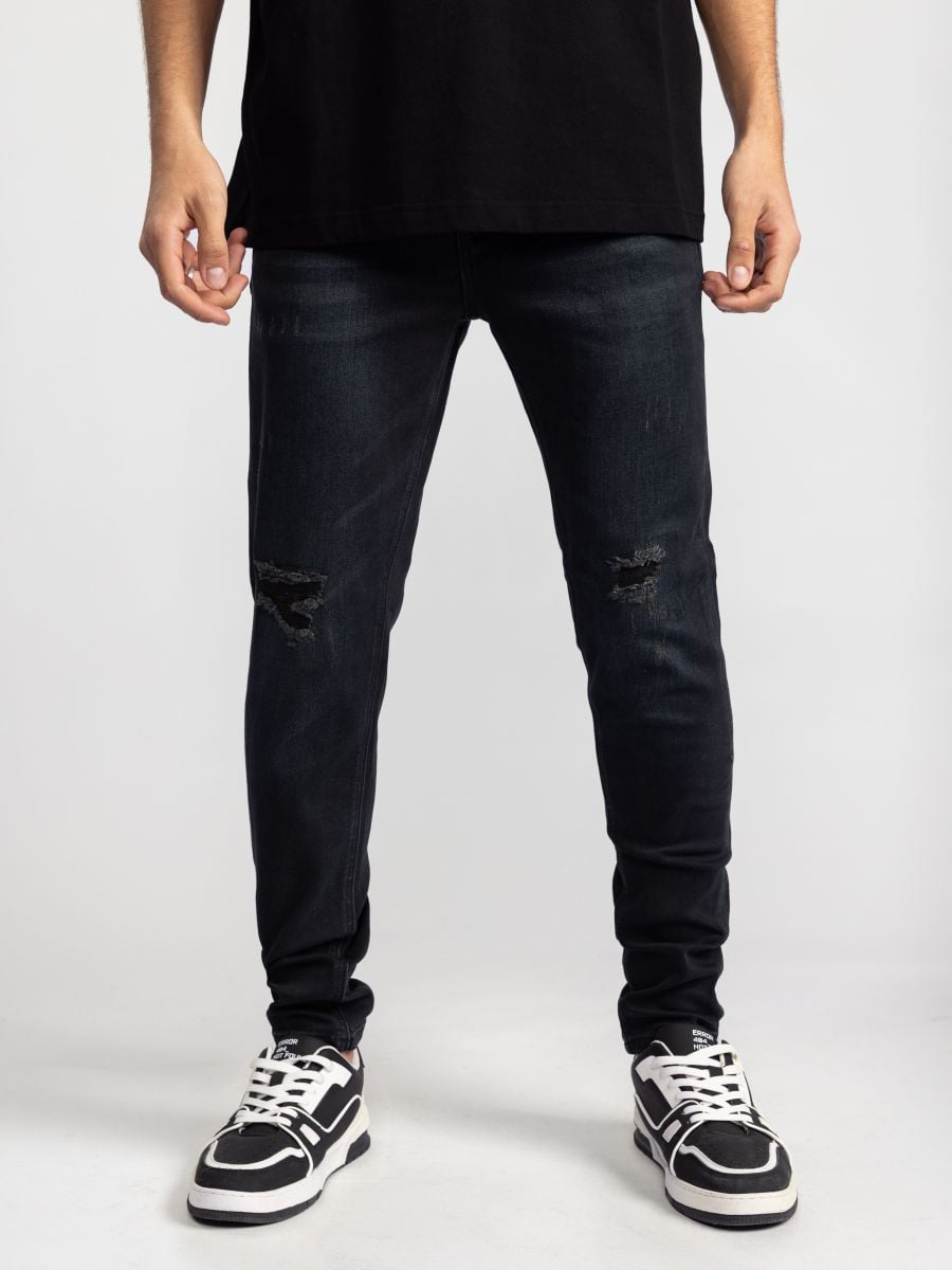 גינס לגבר עם קרעים