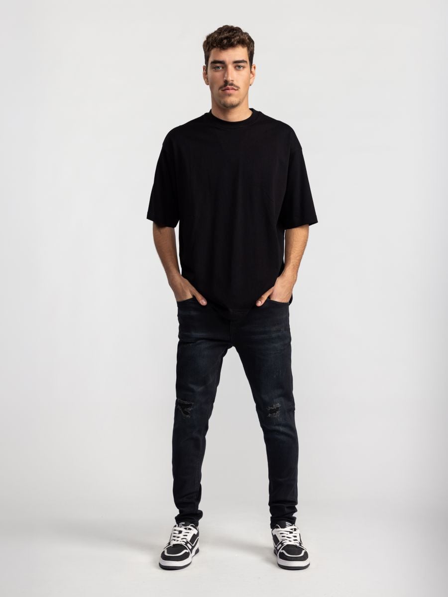 גינס לגבר עם קרעים