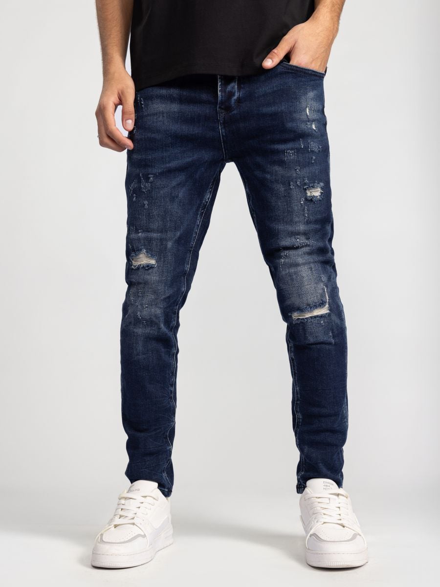 גינס לגבר עם קרעים ושטיפות