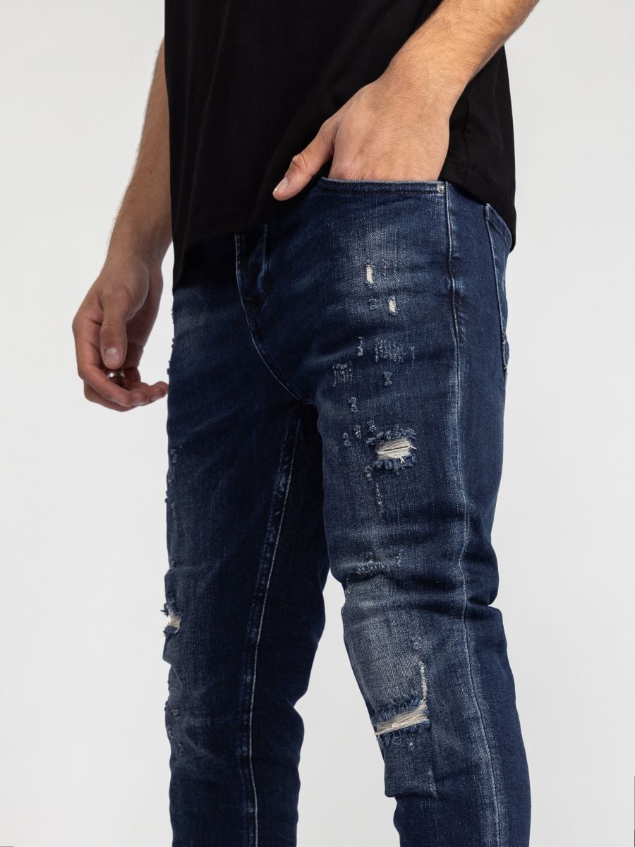 גינס לגבר עם קרעים ושטיפות