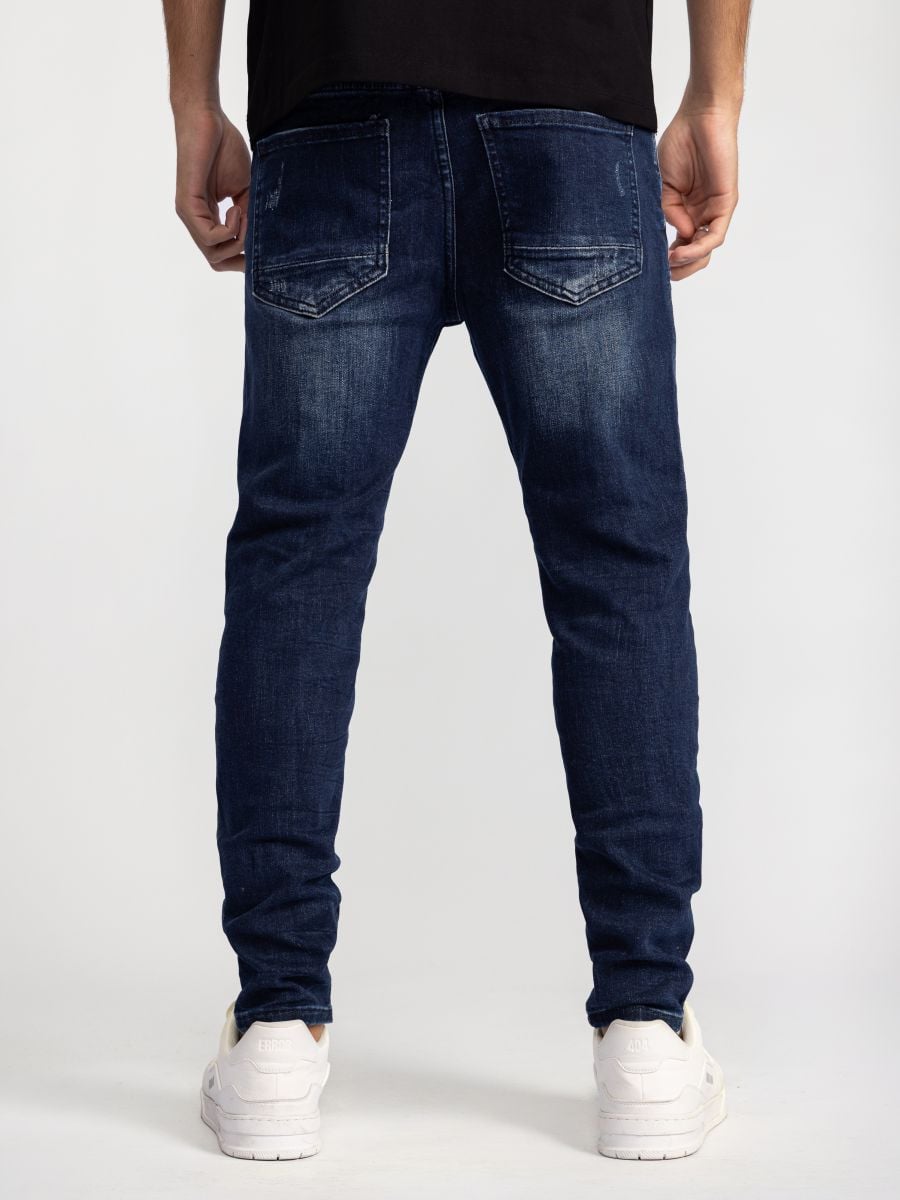 גינס לגבר עם קרעים ושטיפות