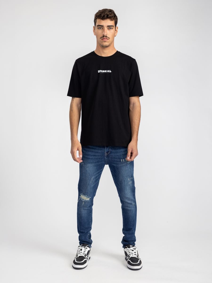 גינס סקיני עם קרעים ורוכסנים בסיומת