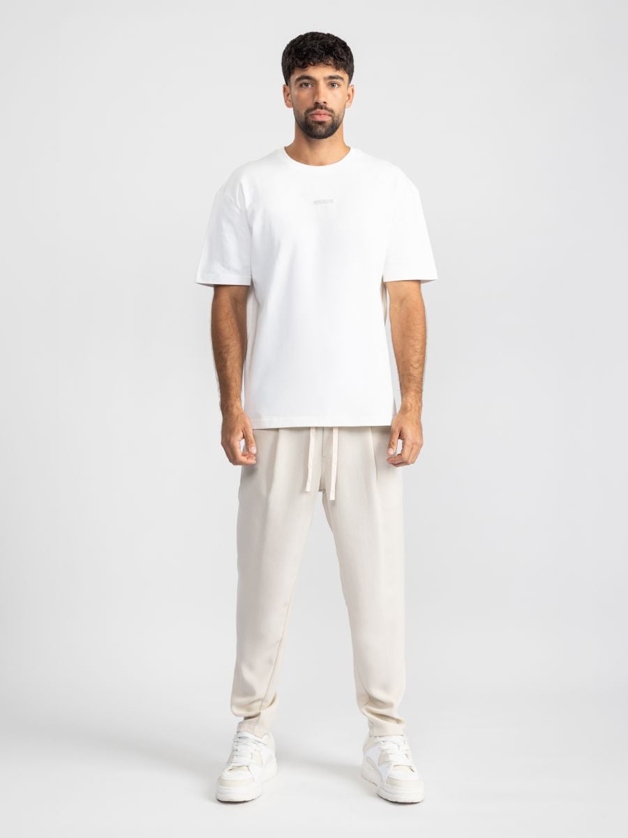 מכנסי בד טקסטורליים עם גומי ושרוך לגבר