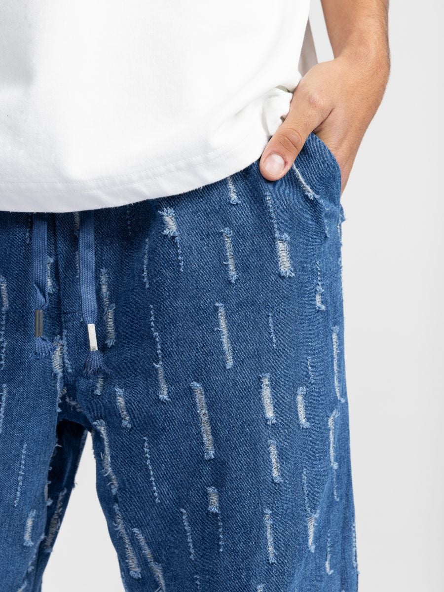 מכנסי בד לגבר בטקסטורה פרומה